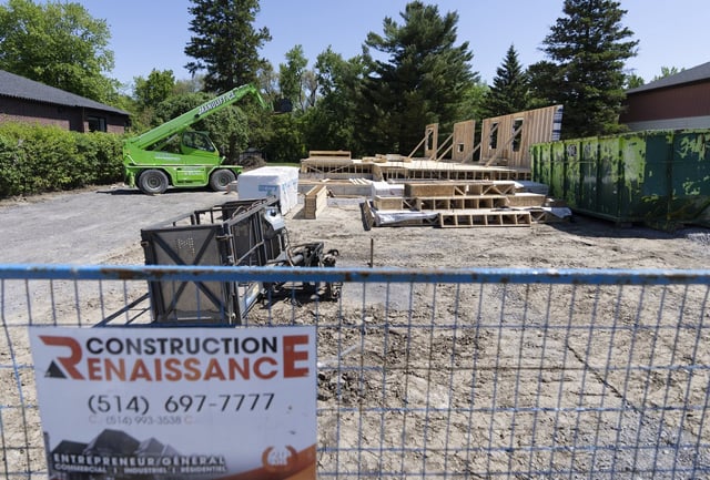 Work stoppage is seen on a residential construction site in the Montreal suburb of Pointe-Claire, Que., on Wednesday, May 28, 2025. THE CANADIAN PRESS/Christinne Muschi