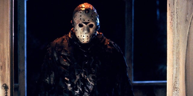 Jason Voorhees stands in a doorway in 'Friday the 13th: The New Blood'