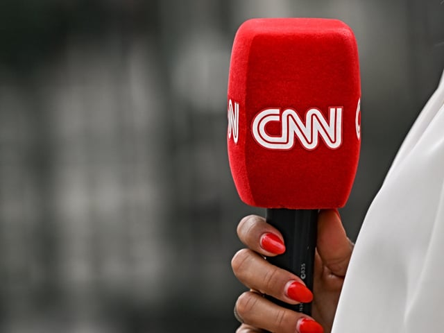 PARIS, FRANCE - JULY 08:      
CNN microphone held by a reporter outside the entrance gate to the Palais Bourbon, home to the French National Assembly, on July 08, 2024, in Paris, France. (Photo by Artur Widak/NurPhoto)