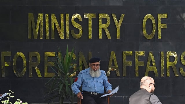 A police officer keeps vigil outside the Pakistan's ministry of foreign affairs, in Islamabad.