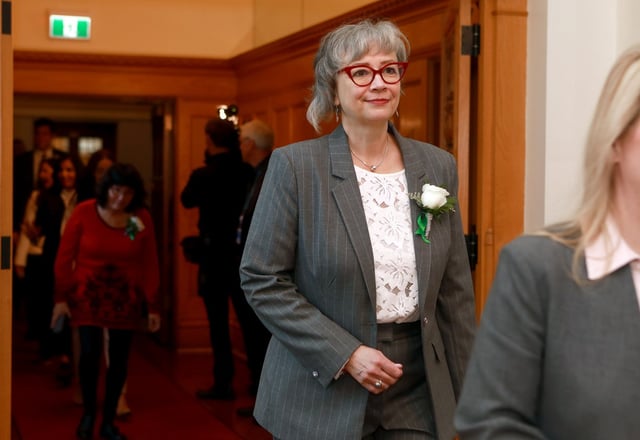 MLA for New Westminister-Coquitlam Jennifer Whiteside, later appointed Minister of Labour, walks towards the legislative assembly for the oath ceremony at the legislature in Victoria, B.C., on Wednesday Nov. 13, 2024. THE CANADIAN PRESS/Chad Hipolito