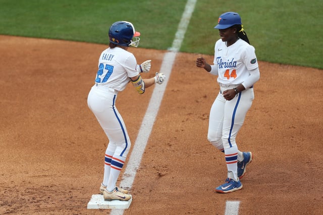 May 7, 2025; Athens, GA, USA; Florida outfielder Kendra Falby (27) reacts to getting on base with Florida outfielder Townsen Thomas (44) during a game against Ole Miss at Jack Turner Stadium. Mandatory Credit: Mady Mertens-Imagn Images