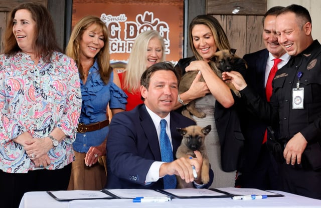 Gov. Ron DeSantis signs two animal rights bills into law at Big Dog Ranch Rescue in Loxahatchee Groves on Wednesday, May 28, 2025. (Amy Beth Bennett / South Florida Sun Sentinel)
