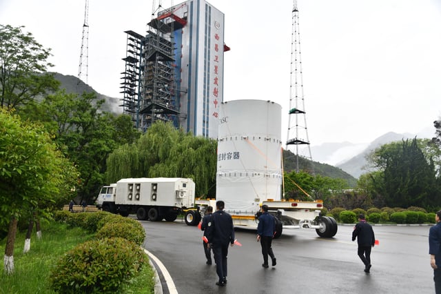 China's Tianwen-2 probe is transported to its launch area, after completing its scheduled assembly, testing and fueling at the technical area of the Xichang Satellite Launch Center in southwest China's Sichuan Province, May 18, 2025. The probe is scheduled for launch at the end of May, according to the China National Space Administration (CNSA) on Sunday. It will subsequently conduct functional checks and joint tests. Previously, the Long March-3B Y110 rocket, which will carry out the Tianwen-2 launch mission, was transferred from the technical area to the launch area on May 14 and completed lifting and docking operations, said the CNSA. China Xichang Tianwen 2 Transport Launch Area - 18 May 2025