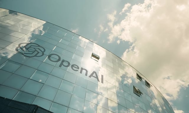 PARIS, FRANCE - AUGUST 10, 2024. OpenAI logo on the modern office building, view from below