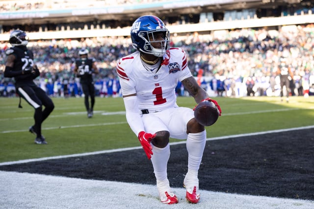 Jan 5, 2025; Philadelphia, Pennsylvania, USA; New York Giants wide receiver Malik Nabers (1) scores a touchdown against the Philadelphia Eagles during the fourth quarter at Lincoln Financial Field. Mandatory Credit: Bill Streicher-Imagn Images