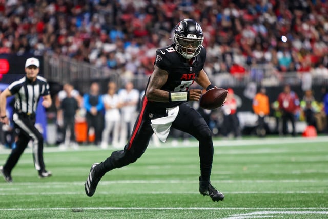 Jan 5, 2025; Atlanta, Georgia, USA; Atlanta Falcons quarterback Michael Penix Jr. (9) scrambles for a touchdown against the Carolina Panthers in the second quarter at Mercedes-Benz Stadium. Mandatory Credit: Brett Davis-Imagn Images