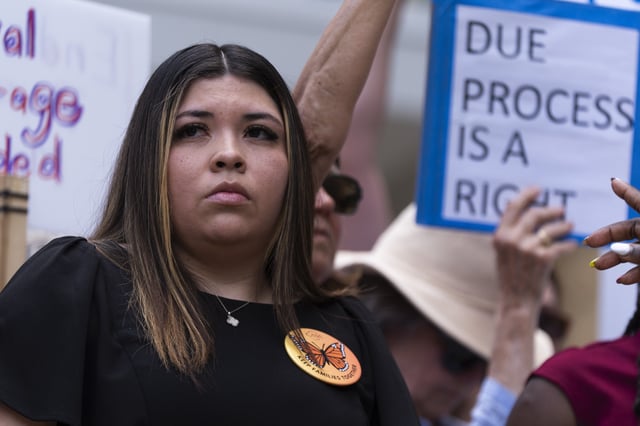 Wife of Kilmar Abrego Garcia, Jennifer Vasquez Sura, joins a rally outside the U.S. Courthouse in Greenbelt, Md., where a federal judge in Maryland will hear arguments Friday, May 16, 2025. (AP Photo/Manuel Balce Ceneta)