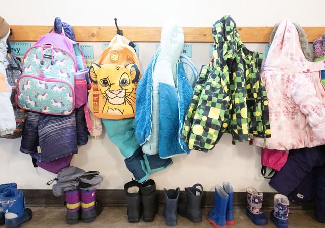 Elementary students coats and boots are seen in a school in Edmonton on Tuesday, April 1, 2025. THE CANADIAN PRESS/Christinne Muschi