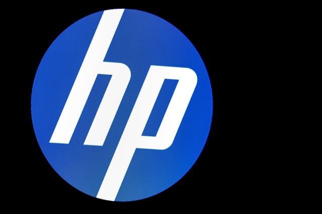 A screen displays the logo for HP Inc. at the New York Stock Exchange (NYSE) in New York, U.S., November 18, 2019. REUTERS/Brendan McDermid/File Photo