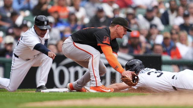 Detroit Tigers’ Jake Rogers slides safely into third base ahead of the tag of San Francisco Giants third baseman Matt Chapman in the fifth inning during a baseball game, Wednesday, May 28, 2025, in Detroit.