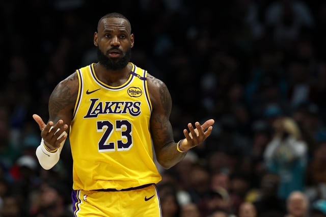 LeBron James #23 of the Los Angeles Lakers reacts during the second half of the game against the Charlotte Hornets at Spectrum Center on January 27, 2025 in Charlotte, North Carolina.