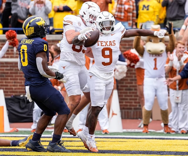 Texas running back Jerrick Gibson (9) celebrates a touchdown against Michigan during the first half at Michigan Stadium in Ann Arbor on Saturday, September 7, 2024.
