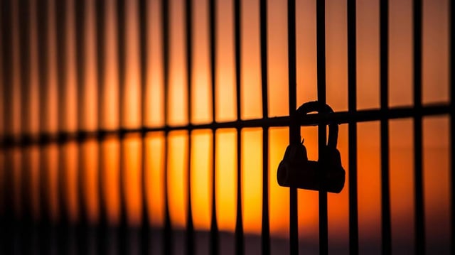 A former jail official in Massachusetts has been arrested on extortion charges, according to prosecutors.