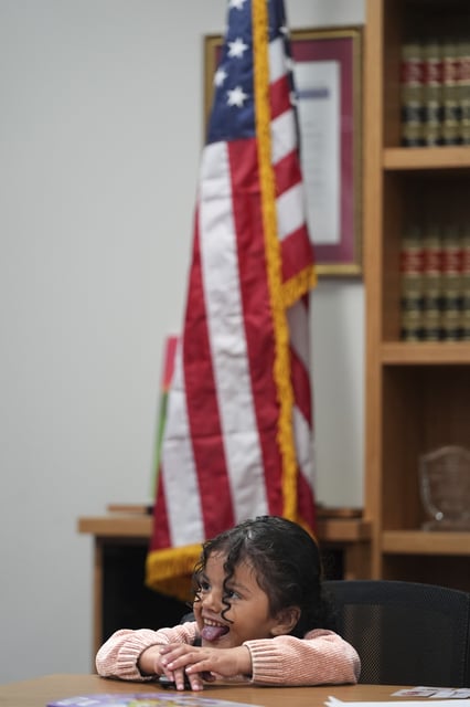 A 4-year-old Mexican girl, who has short bowel syndrome, attends a news conference in Los Angeles, Wednesday, May 28, 2025, after her and her mother's humanitarian parole was terminated and they were ordered to self-deport. (AP Photo/Jae C. Hong)