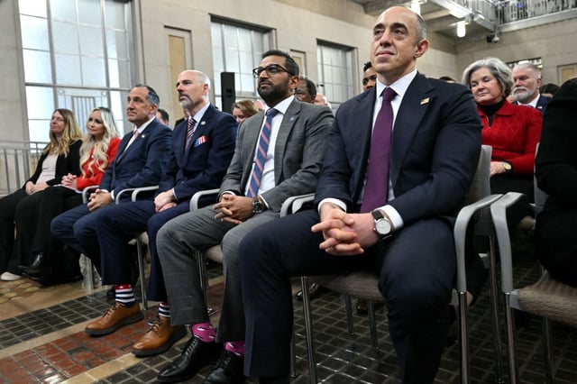 Emil Bove, right, listens as President Donald Trump speaks at the Department of Justice in Washington in March.