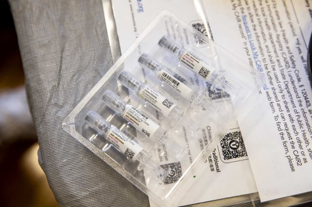 A tray of COVID-19 vaccines is seen at the Kaiser Permanente adult vaccine clinic in San Francisco in September.