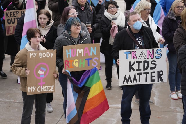 FILE - People gather in support of transgender youth during a rally at the Utah State Capitol Tuesday, Jan. 24, 2023, in Salt Lake City. (AP Photo/Rick Bowmer, File)