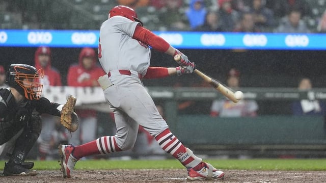 May 28, 2025; Baltimore, Maryland, USA; St. Louis Cardinals second baseman Brendan Donovan (33) hits a single against the St. Louis Cardinals during the fourth inning at Oriole Park at Camden Yards. Mandatory Credit: Gregory Fisher-Imagn Images