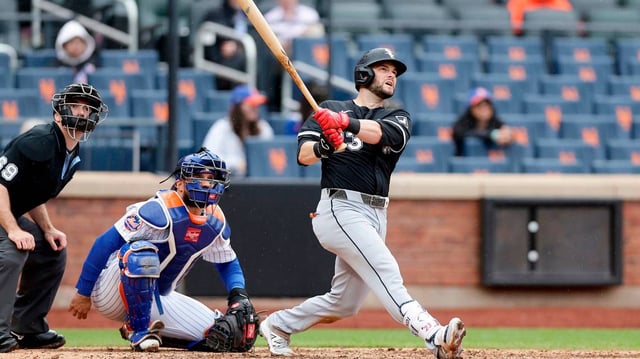Andrew Benintendi of the Chicago White Sox follows through on his eighth-inning home run against the New York Mets at Citi Field on Wednesday, May 28, 2025, in New York. (Jim McIsaac/Getty Images/TNS)