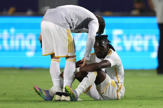 Galaxy forward Joseph Paintsil, bottom, is consoled by a teammate at the end of their 1-0 loss to the San Jose Earthquakes on Wednesday night, May 28, 2025, at Dignity Health Sports Park in Carson. San Jose won, 1-0, extending the Galaxy’s season-long winless streak to 16 games. (Photo by Raul Romero Jr., Contributing Photographer)