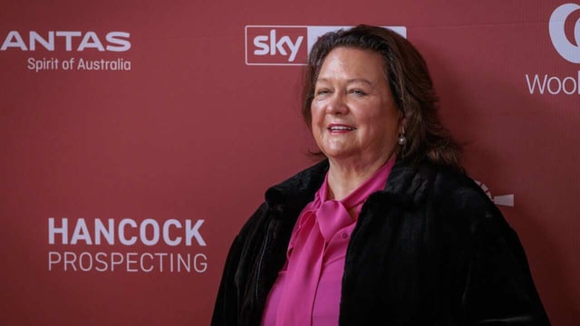 Gina Rinehart has topped the Australian Financial Review's Rich List for another year, despite a drop in her fortune, while the collective wealth of the country's 200 richest has increased.