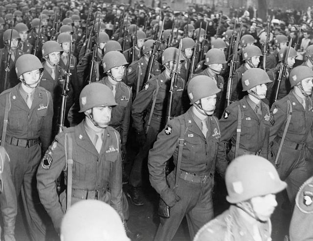 Members of the 82nd Airborne Division march in a parade along Fifth Avenue in New York City after returning to the U.S. following World War Two, on January 12, 1946.