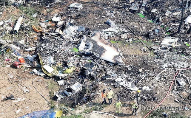 Authorities respond after a Navy patrol aircraft carrying four people crashed on a mountain in the southeastern port city of Pohang on May 29, 2025. (Yonhap) 