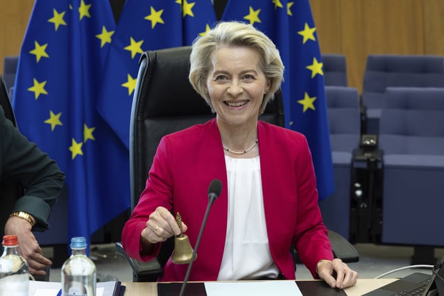 European Commission President Ursula von der Leyen rings a bell to signify the beginning of the weekly college of commissioners meeting at EU headquarters in Brussels, Wednesday, May 21, 2025. (AP Photo/Omar Havana)