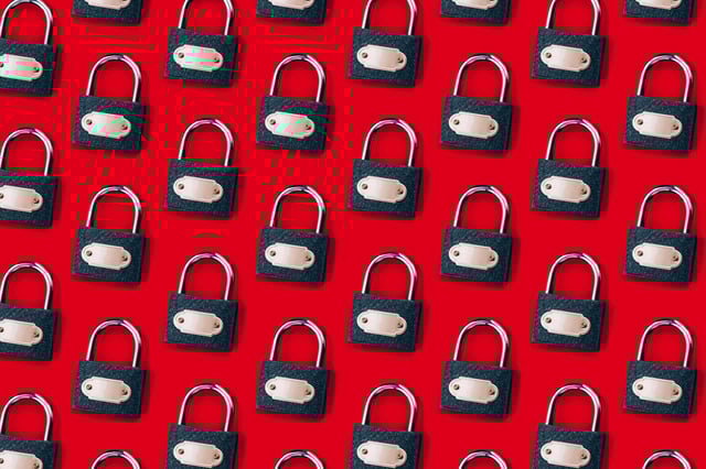 Pattern with modern locks on a red background close-up