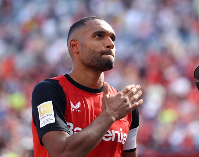 Soccer Football - Bundesliga - Bayer Leverkusen v Borussia Dortmund - BayArena, Leverkusen, Germany - May 11, 2025 Jonathan Tah applauds fans after playing his last home game for Bayer Leverkusen REUTERS/Thilo Schmuelgen/File Photo