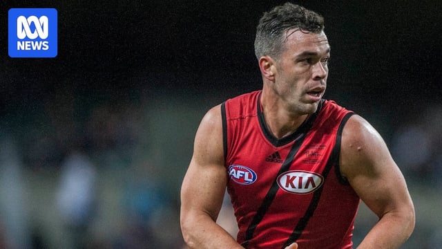 Ryan Crowley playing football for Essendon. 