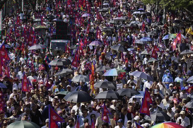 Pro-monarchy supporters take part in a rally calling for the restoration of Nepal's monarchy in Kathmandu, Nepal, Thursday, May 29, 2025. (AP Photo/Niranjan Shrestha)