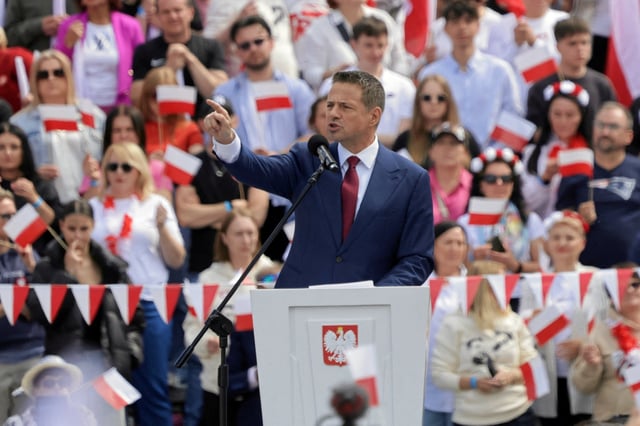 Warsaw Mayor Rafal Trzaskowski, the presidential candidate of the Civic Coalition, speaks as he attends "Patriotic March" organised by the ruling party, ahead of the second round of presidential elections, in Warsaw, Poland, May 25, 2025. Agencja Wyborcza.pl/Kuba Atys via REUTERS/ File Photo