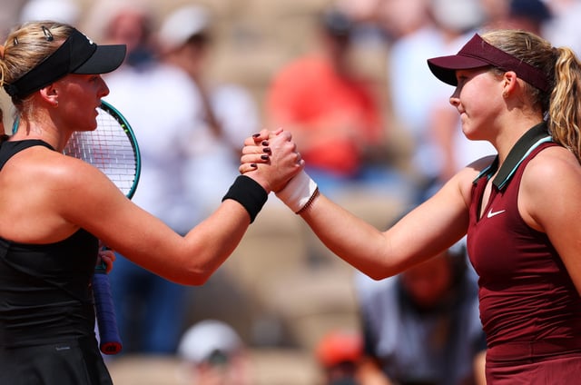 Tennis - French Open - Roland Garros, Paris, France - May 29, 2025 Russia's Mirra Andreeva shakes hands with Ashlyn Krueger of the U.S. after winning her second round match REUTERS/Denis Balibouse