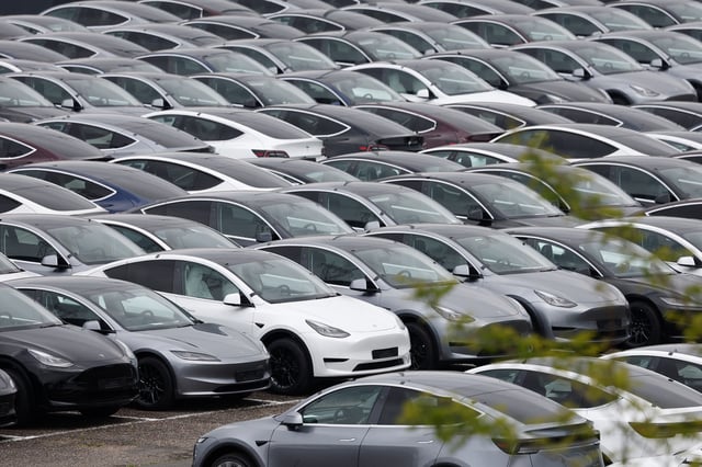 Tesla electric vehicles are pictured at one of the company's delivery centers in Valenton, near Paris, France, April 24, 2025. REUTERS/Benoit Tessier/File Photo