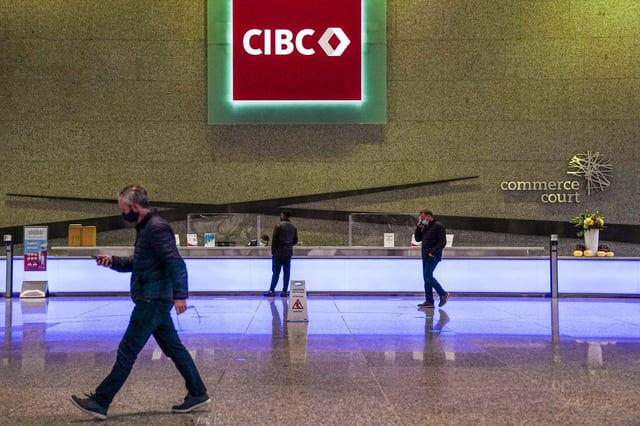 A CIBC logo is displayed in the lobby of its headquarters in Toronto on Monday, Oct. 25, 2021. THE CANADIAN PRESS/Evan Buhler