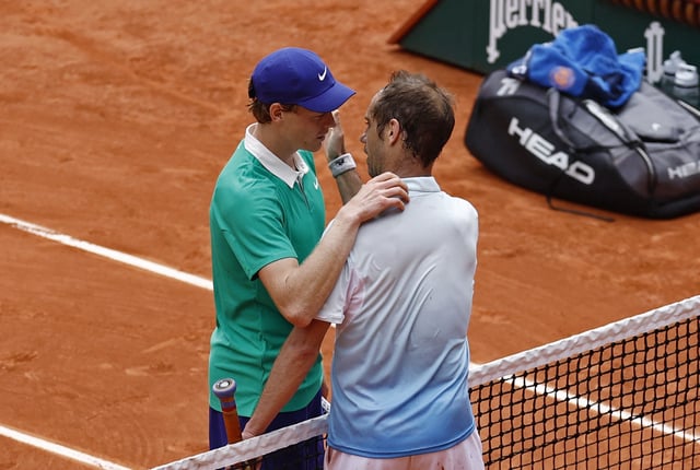Tennis - French Open - Roland Garros, Paris, France - May 29, 2025 Italy's Jannik Sinner with France's Richard Gasquet after winning his second round match REUTERS/Stephanie Lecocq