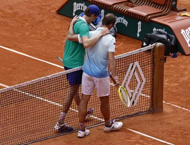 Tennis - French Open - Roland Garros, Paris, France - May 29, 2025 Italy's Jannik Sinner with France's Richard Gasquet after winning his second round match REUTERS/Stephanie Lecocq