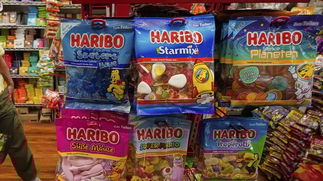 Haribo has urgently recalled its Happy Cola F!ZZ sweets after a family fell ill. (AP Photo/Richard Drew)