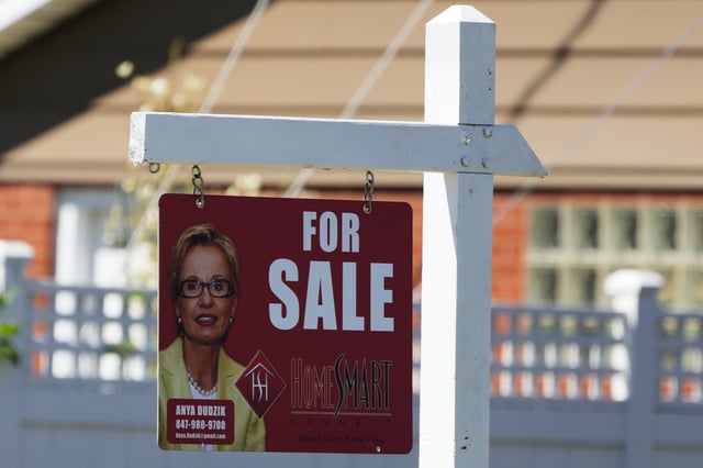 FILE - A for sale sign stands outside a residence in Niles, Ill., Monday, July 1, 2024. (AP Photo/Nam Y. Huh, File)
