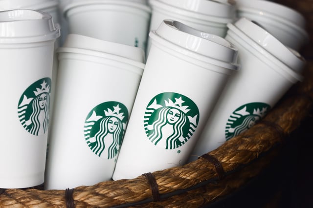 Starbucks reusable cups are seen on in Starbucks Coffee in Krakow, Poland on August 19, 2023.