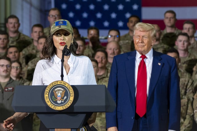 Gretchen Whitmer speaks as Donald Trump listens during an event with members of the Michigan National Guard on April 29, 2025, in Harrison Township, Mich.