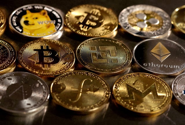 Representations of cryptocurrencies are seen in this illustration, August 10, 2022. REUTERS/Dado Ruvic/Illustration/File Photo