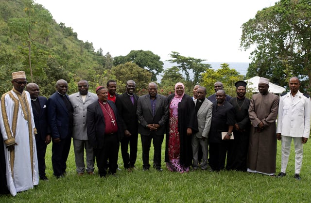 Democratic Republic of Congo's former President Joseph Kabila poses for a photograph with the religious leaders after a meeting to help find a "solution" to the crisis in the country's eastern regions, where Rwanda-backed M23 rebels have seized significant territory, in Goma, North Kivu, Democratic Republic of Congo, May 29, 2025. REUTERS/Arlette Bashizi