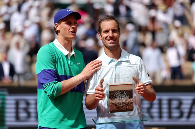 Tennis - French Open - Roland Garros, Paris, France - May 29, 2025 France's Richard Gasquet poses with Italy's Jannik Sinner after playing his last professional tennis match REUTERS/Gonzalo Fuentes