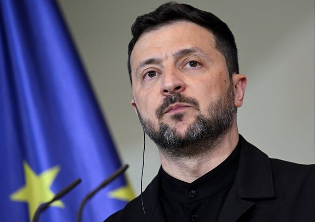Ukrainian President Volodymyr Zelenskiy attends a press conference with German Chancellor Friedrich Merz (not pictured), following their talks at the Chancellery in Berlin, Germany, May 28, 2025.REUTERS/Annegret Hilse/File Photo