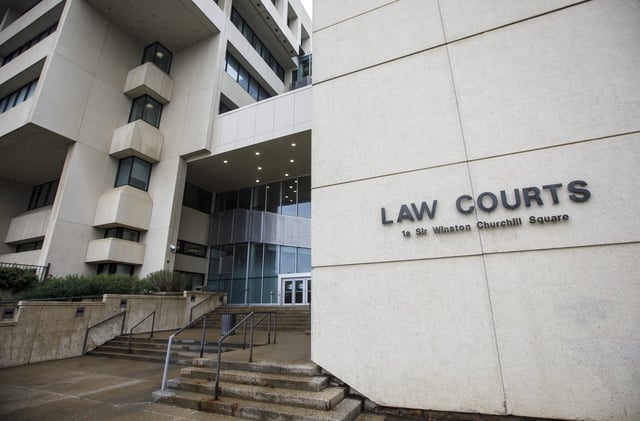 Edmonton Law Courts are shown in Edmonton on Wednesday, July 8, 2020. An Alberta woman who was released from an Edmonton area jail with allegedly fake release papers has been arrested in B.C. THE CANADIAN PRESS/Jason Franson