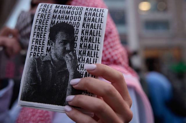 A pro-Palestinian demonstrator holds a "Free Mahmoud Khalil" sign as they protest in Union Square Park, New York, on May 15, 2025.