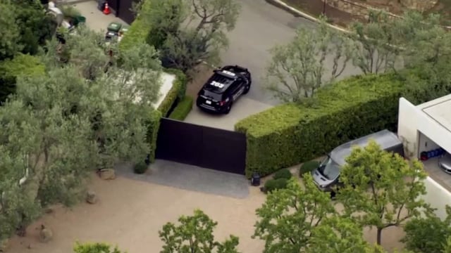 Aerial view of gate outside Jennifer Aniston’s Bel Air home.
